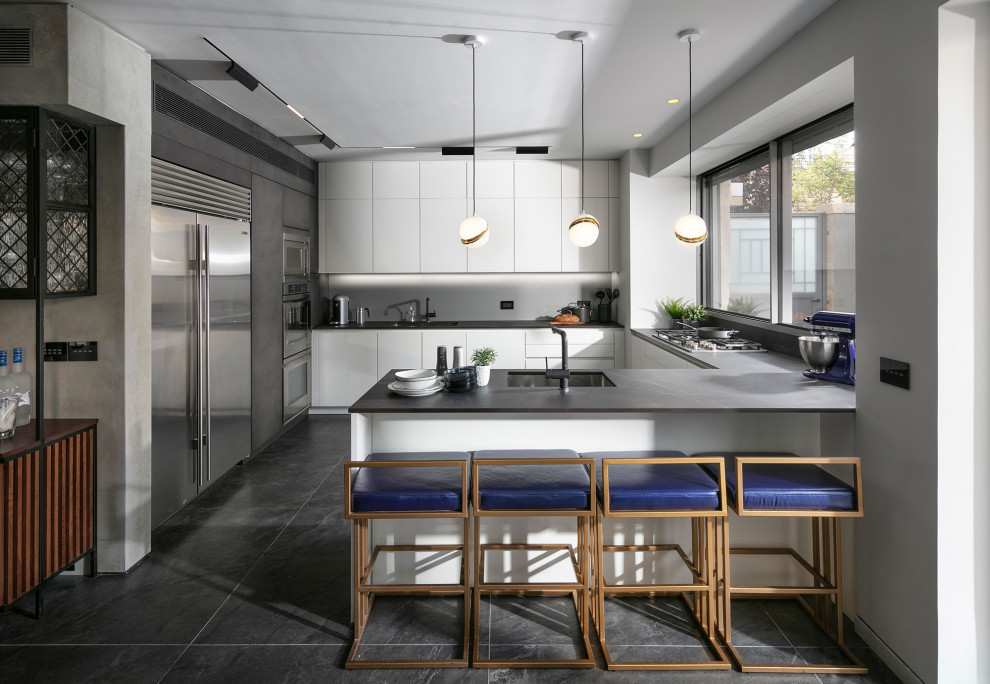 Sleek kitchen of grays and white - Contemporary - Kitchen - by Gittie