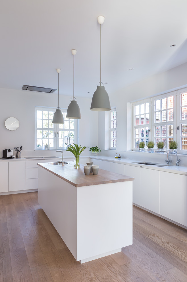 This is an example of a scandi grey and cream kitchen in London.