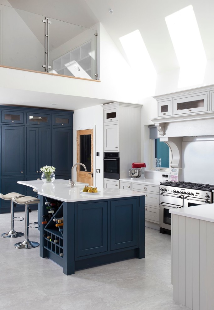 Photo of a traditional grey and cream kitchen in Other.