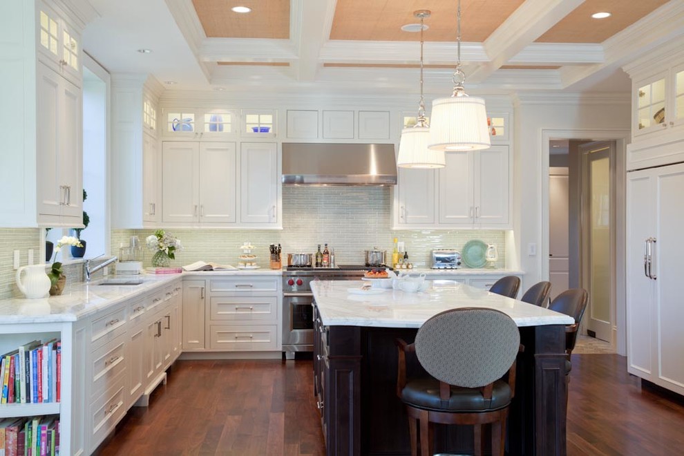 Mid-sized elegant l-shaped dark wood floor eat-in kitchen photo in Boston with an undermount sink, beaded inset cabinets, white cabinets, marble countertops, blue backsplash, glass tile backsplash, stainless steel appliances and an island