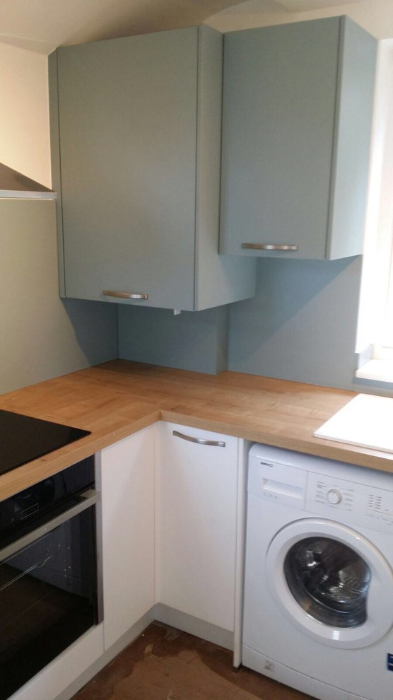 Small Two Tone Matt White and Aqua Kitchen with Wooden Worktops