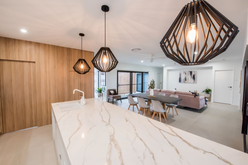 Moderne Wohnküche mit Quarzwerkstein-Arbeitsplatte in Sydney