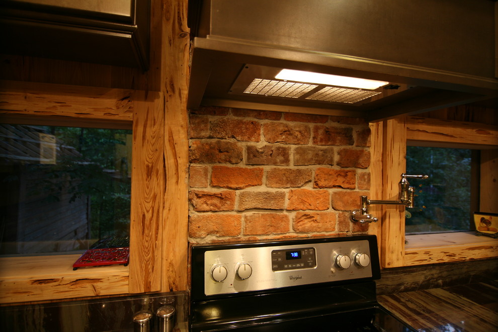 Example of a mountain style kitchen design in Birmingham