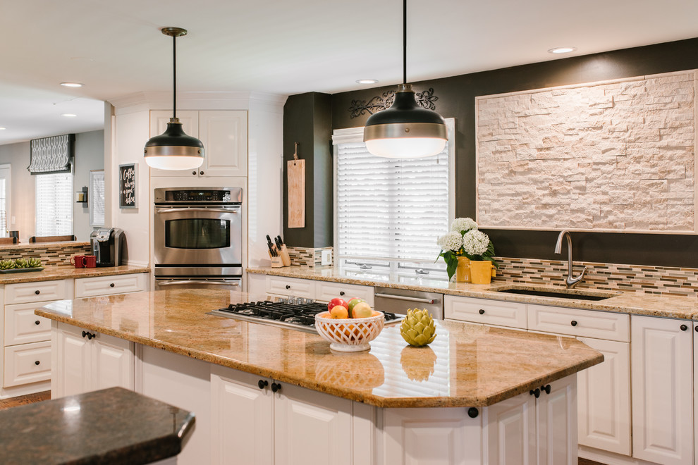 Large urban l-shaped medium tone wood floor and brown floor kitchen photo in Chicago with a single-bowl sink, raised-panel cabinets, white cabinets, granite countertops, an island, multicolored backsplash, matchstick tile backsplash and stainless steel appliances