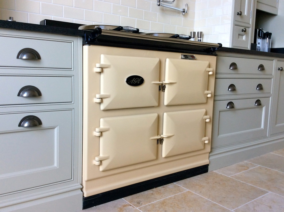 Inspiration for a traditional kitchen in Edinburgh with granite worktops, beige splashback, metro tiled splashback and coloured appliances.