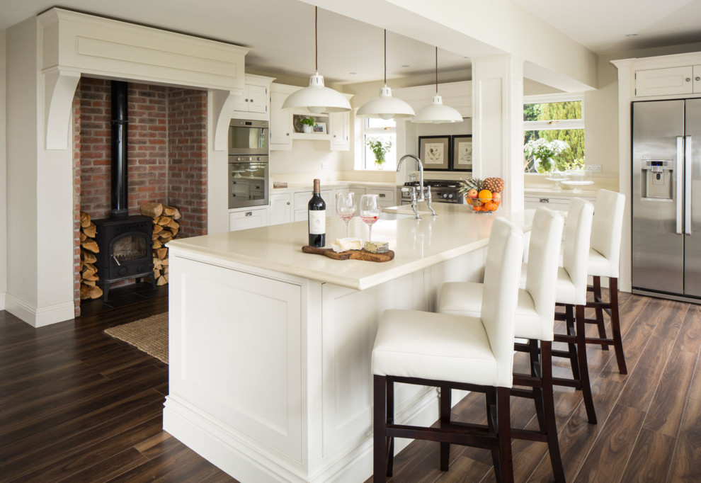 Traditional kitchen in Dublin with beaded cabinets and white cabinets.