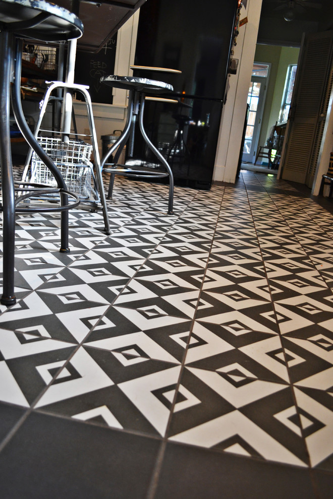Immagine di una cucina contemporanea con pavimento con piastrelle in ceramica