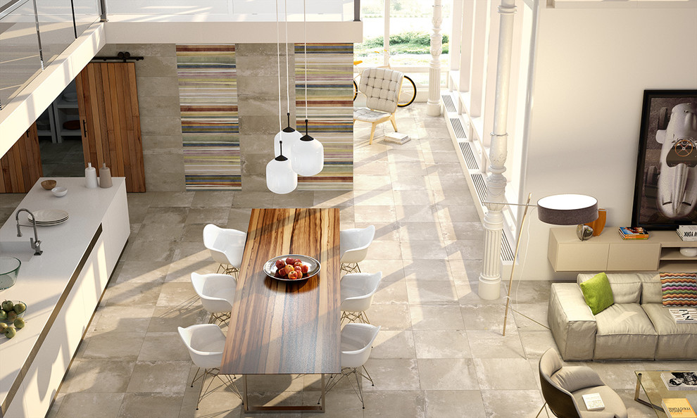Идея дизайна: кухня-гостиная в современном стиле с накладной мойкой, полом из керамогранита и островом