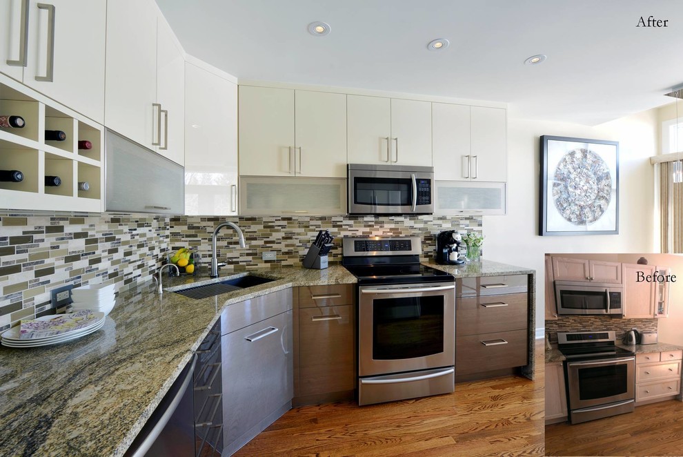 This is an example of a modern l-shaped kitchen/diner in Toronto with a submerged sink, flat-panel cabinets, white cabinets, granite worktops, multi-coloured splashback, glass tiled splashback, stainless steel appliances and no island.