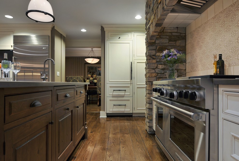 Inspiration for a timeless medium tone wood floor kitchen remodel in New York with an integrated sink