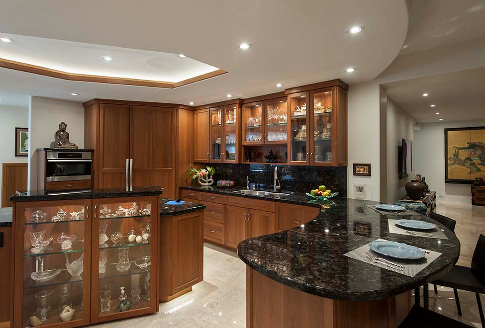 Inspiration for a large classic u-shaped kitchen/diner in Hawaii with a submerged sink, recessed-panel cabinets, dark wood cabinets, granite worktops, multi-coloured splashback, granite splashback, integrated appliances, travertine flooring, an island, beige floors, multicoloured worktops and a coffered ceiling.