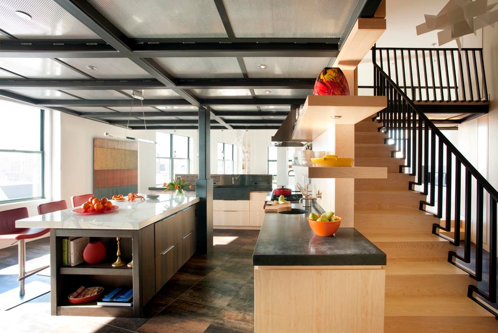 Photo of a contemporary kitchen in Boston with flat-panel cabinets and light wood cabinets.