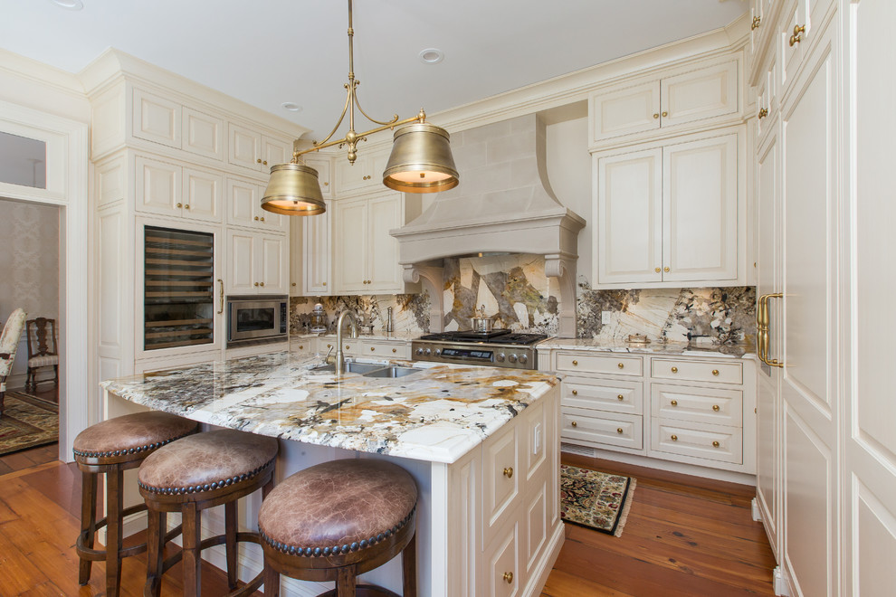 Eclectic kitchen photo in Charleston with granite countertops and stone slab backsplash
