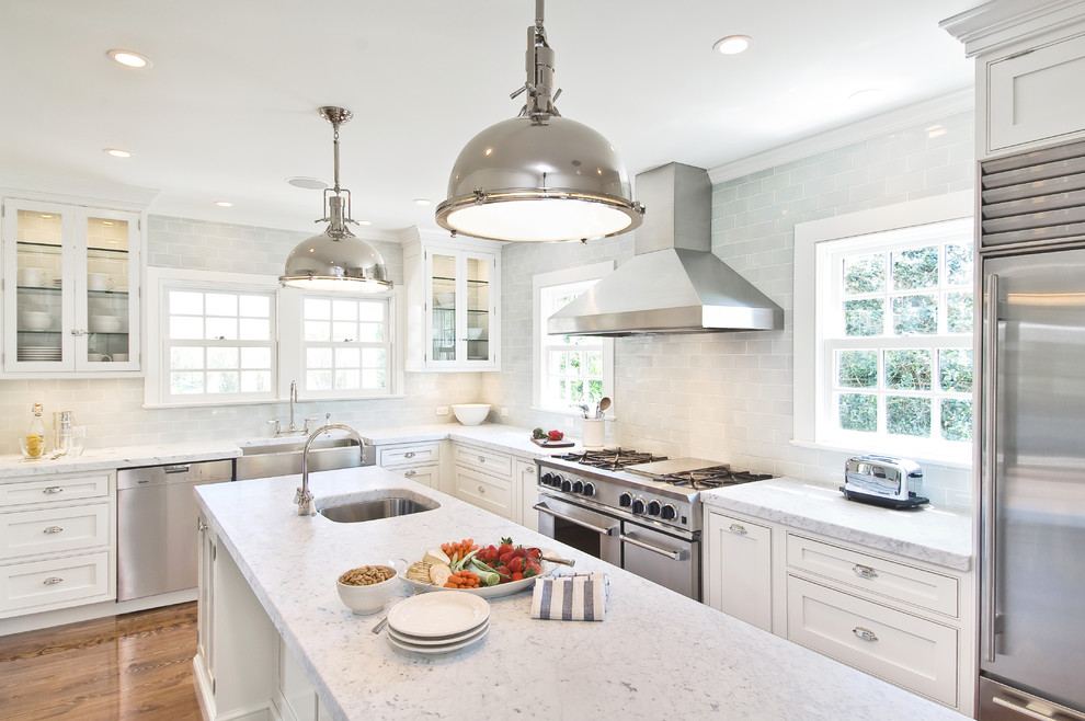Kitchen - traditional kitchen idea in New York with subway tile backsplash