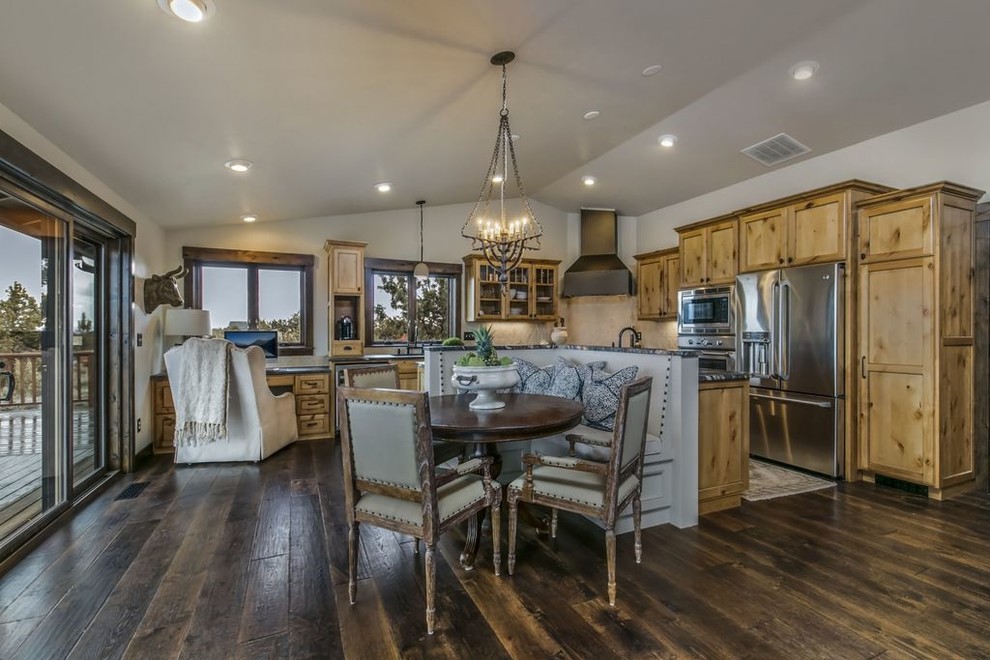 Large southwest l-shaped dark wood floor and brown floor eat-in kitchen photo in Other with an undermount sink, recessed-panel cabinets, light wood cabinets, granite countertops, beige backsplash, stainless steel appliances and an island