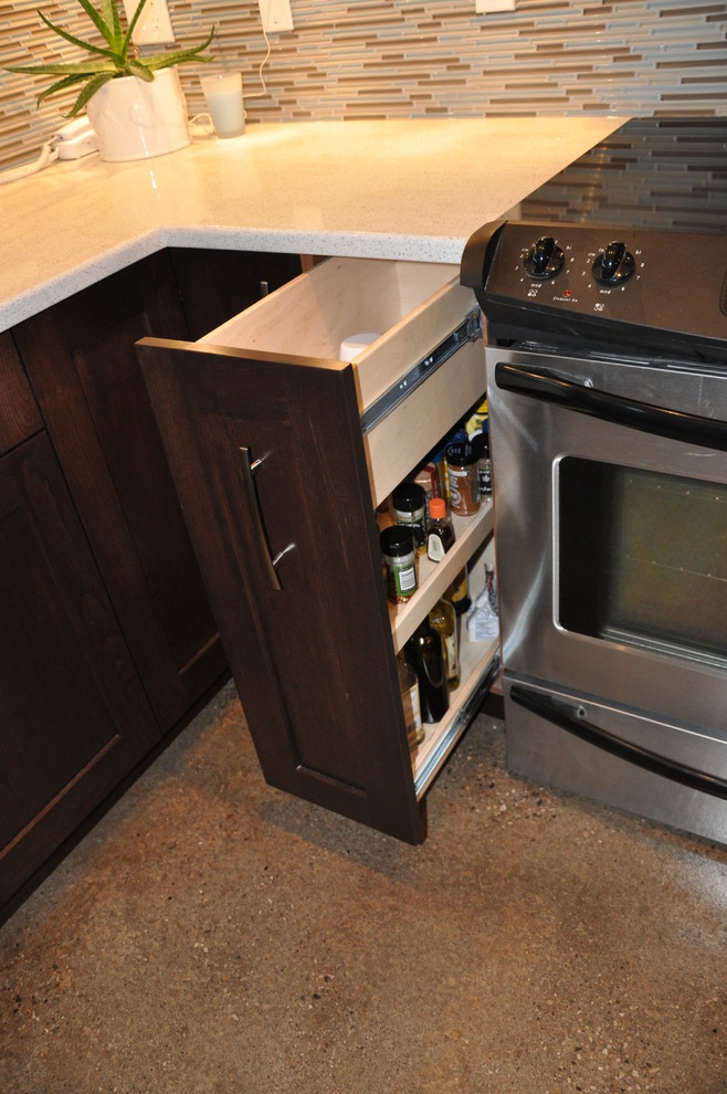 Space creating cupboards Modern Kitchen Calgary by Woodcrafters