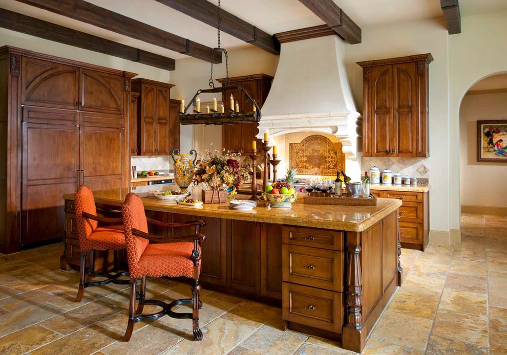 Large tuscan l-shaped travertine floor open concept kitchen photo in Dallas with recessed-panel cabinets, medium tone wood cabinets, granite countertops, beige backsplash, stone tile backsplash, paneled appliances and an island