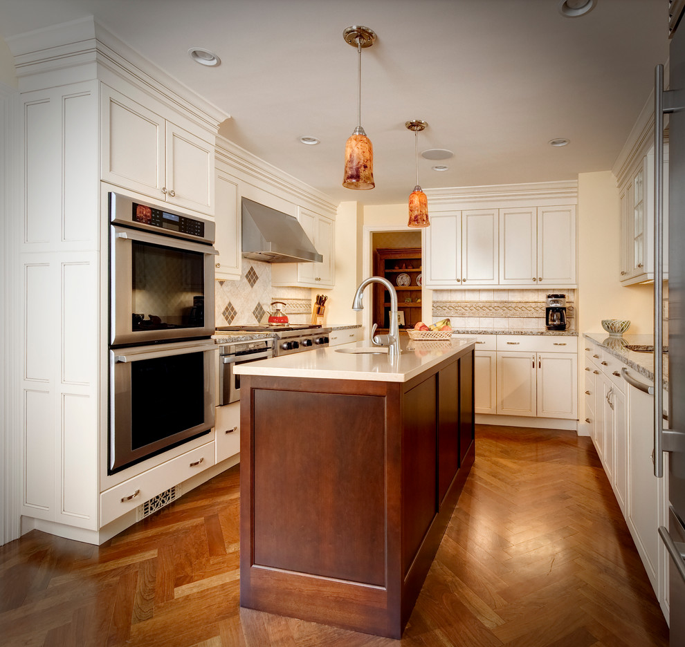 Dark and light makes this narrow kitchen seem wider
