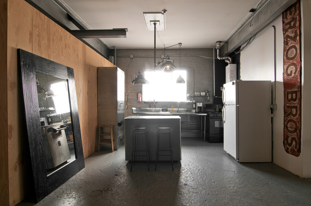 Kitchen - industrial kitchen idea in Salt Lake City with an integrated sink and white appliances