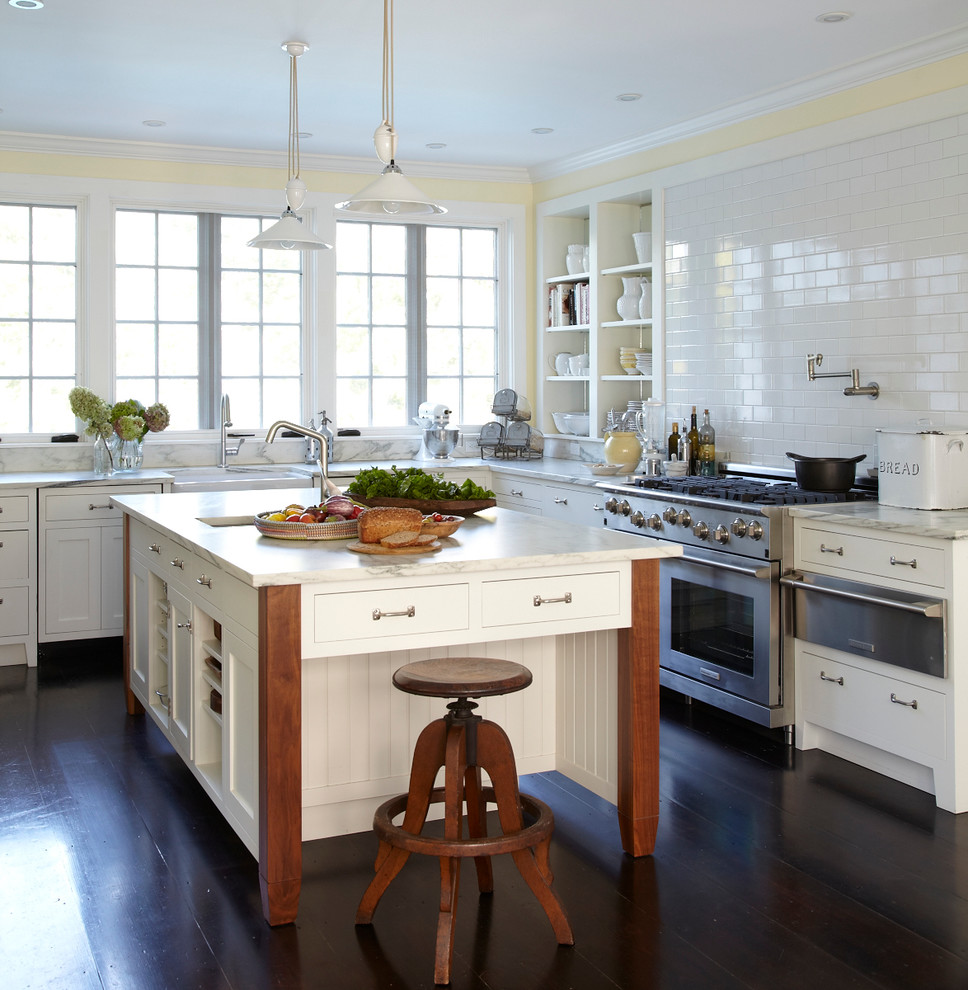 Example of a transitional kitchen design in Boston with open cabinets, white cabinets, white backsplash, subway tile backsplash and stainless steel appliances