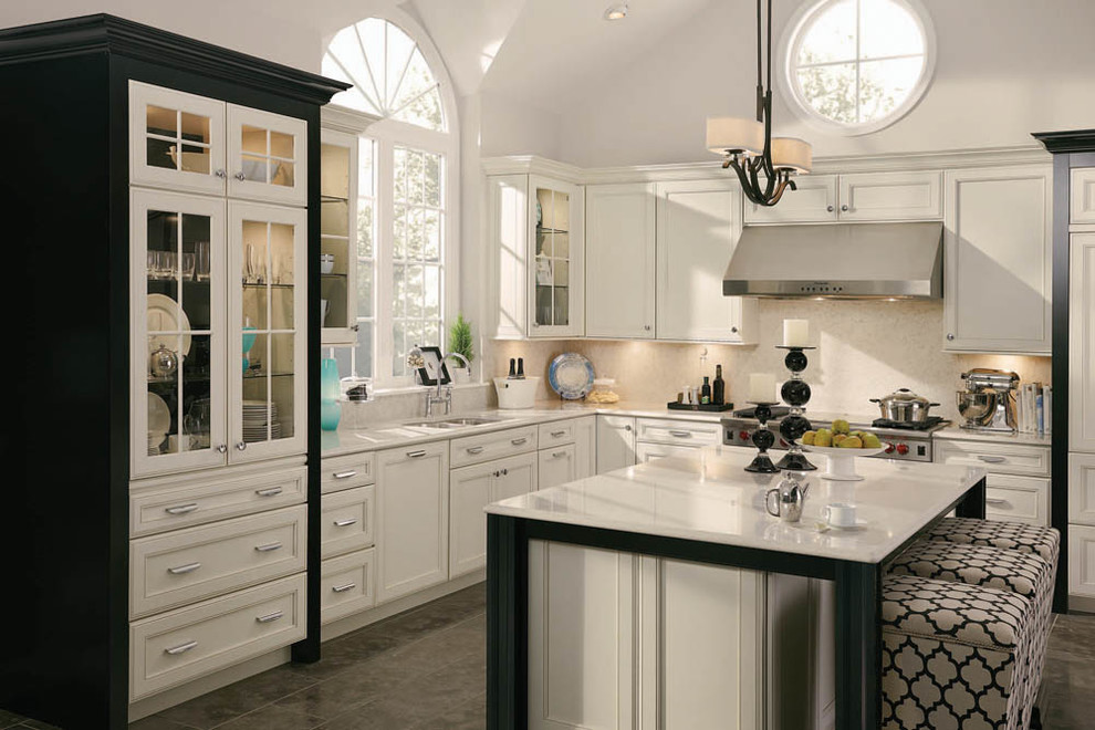 Kitchen - large transitional l-shaped gray floor kitchen idea in Boston with an undermount sink, paneled appliances, recessed-panel cabinets, white cabinets, solid surface countertops, white backsplash, an island and white countertops
