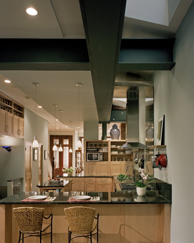 Photo of a contemporary kitchen in Philadelphia with recessed-panel cabinets and light wood cabinets.