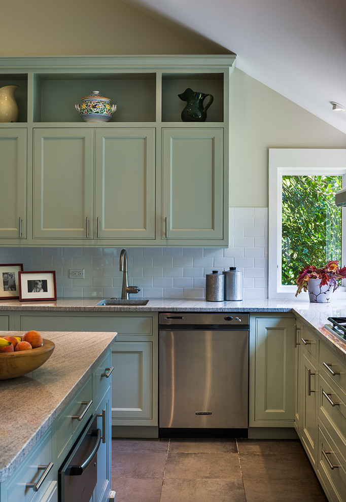 Eat-in kitchen - small farmhouse l-shaped travertine floor eat-in kitchen idea in Philadelphia with beaded inset cabinets, green cabinets, an island, an undermount sink, marble countertops, white backsplash, subway tile backsplash and stainless steel appliances