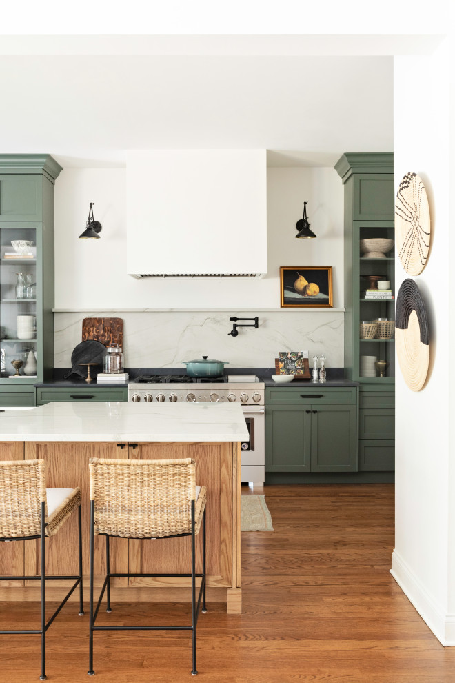 Open concept kitchen - large transitional galley medium tone wood floor and brown floor open concept kitchen idea in Orlando with a farmhouse sink, shaker cabinets and an island