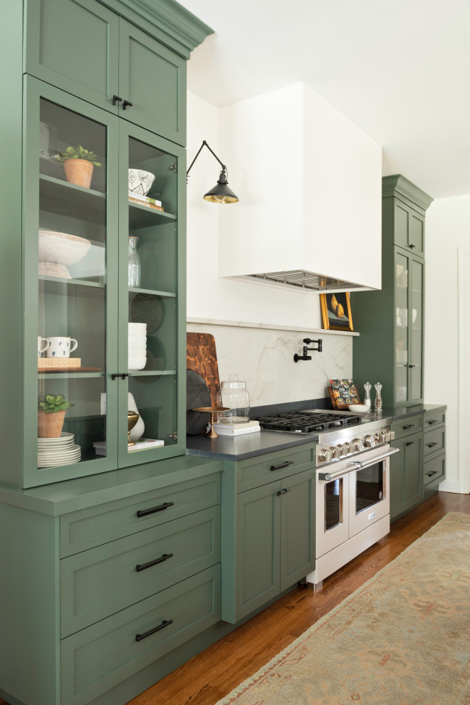 Large transitional galley medium tone wood floor and brown floor open concept kitchen photo in Orlando with a farmhouse sink, shaker cabinets and an island