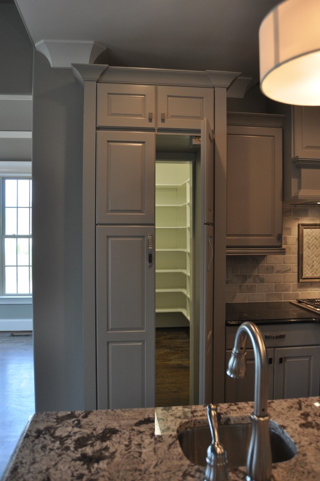 Example of a transitional kitchen design in Raleigh