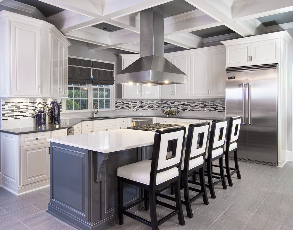 Inspiration for a large timeless ceramic tile and gray floor eat-in kitchen remodel in Atlanta with an undermount sink, raised-panel cabinets, gray cabinets, quartzite countertops, stainless steel appliances, an island and multicolored backsplash