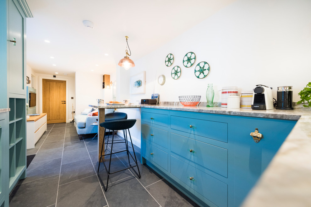 Example of a beach style kitchen design in Cornwall