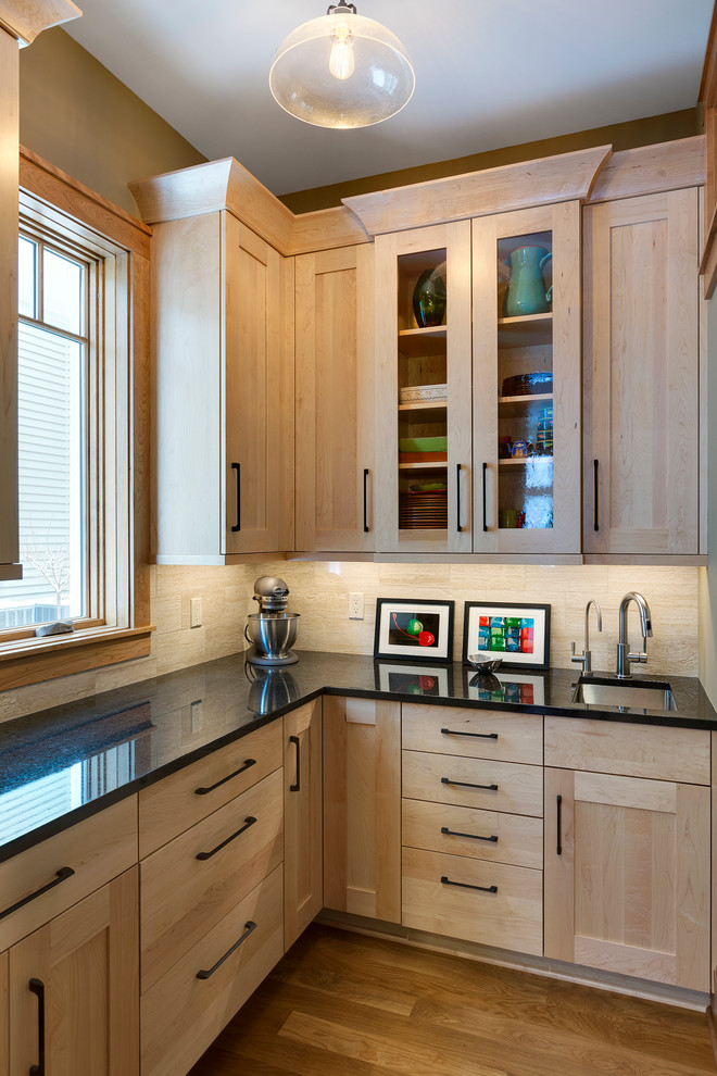 Design ideas for a large traditional l-shaped enclosed kitchen in Minneapolis with a submerged sink, recessed-panel cabinets, light wood cabinets, granite worktops, beige splashback, stainless steel appliances, medium hardwood flooring and no island.