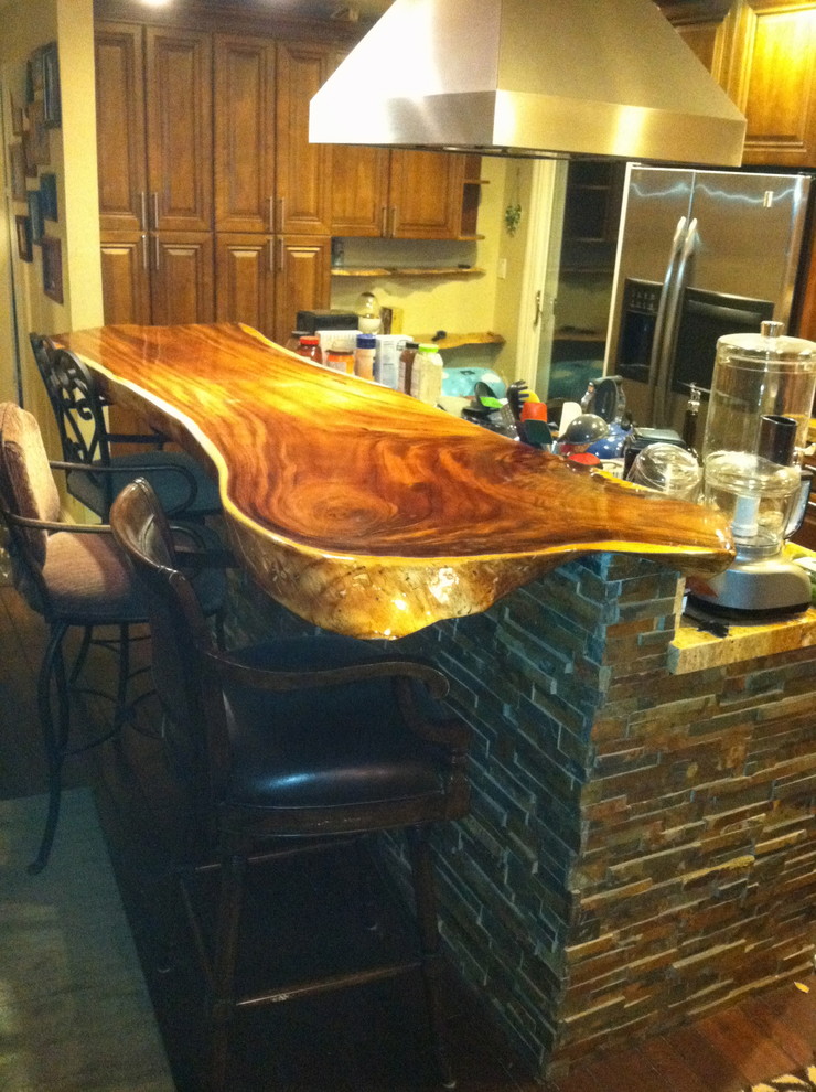 Stacked Stone Island with Wood Slab Bar Top Contemporary Kitchen