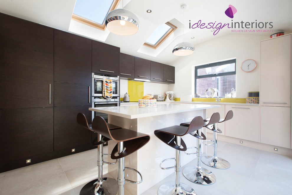 Design ideas for a medium sized contemporary l-shaped kitchen/diner in Other with a submerged sink, flat-panel cabinets, dark wood cabinets, composite countertops, yellow splashback, glass sheet splashback, stainless steel appliances, ceramic flooring and an island.