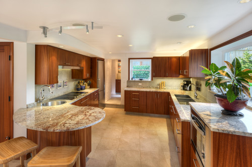 Spacious kitchen with rich wood RTA cabinets illustrating smart financial planning for B2B projects