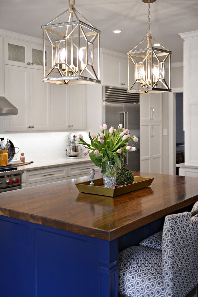 Inspiration for a modern kitchen in Dallas with blue cabinets.