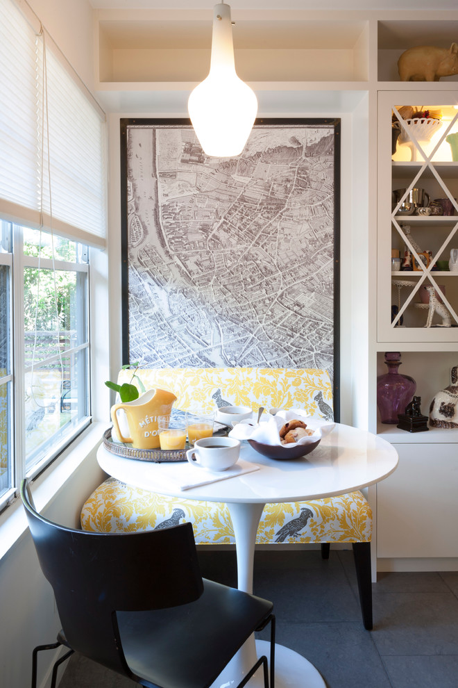 Eat-in kitchen - contemporary eat-in kitchen idea in Austin