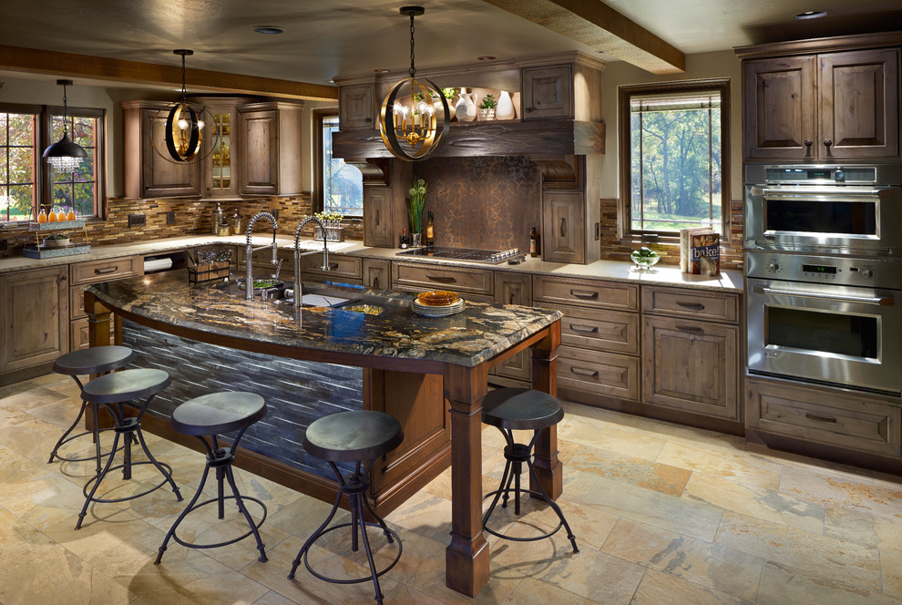 Rustic u-shaped kitchen in Oklahoma City with raised-panel cabinets, medium wood cabinets, brown splashback, matchstick tiled splashback, stainless steel appliances and an island.