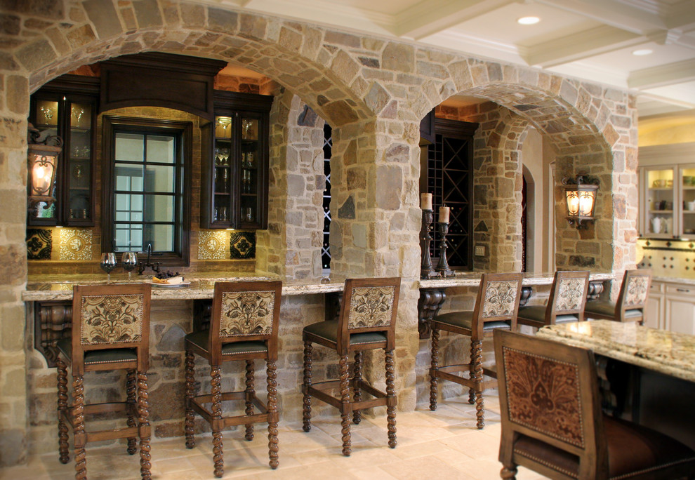 Example of a tuscan kitchen design in Cleveland