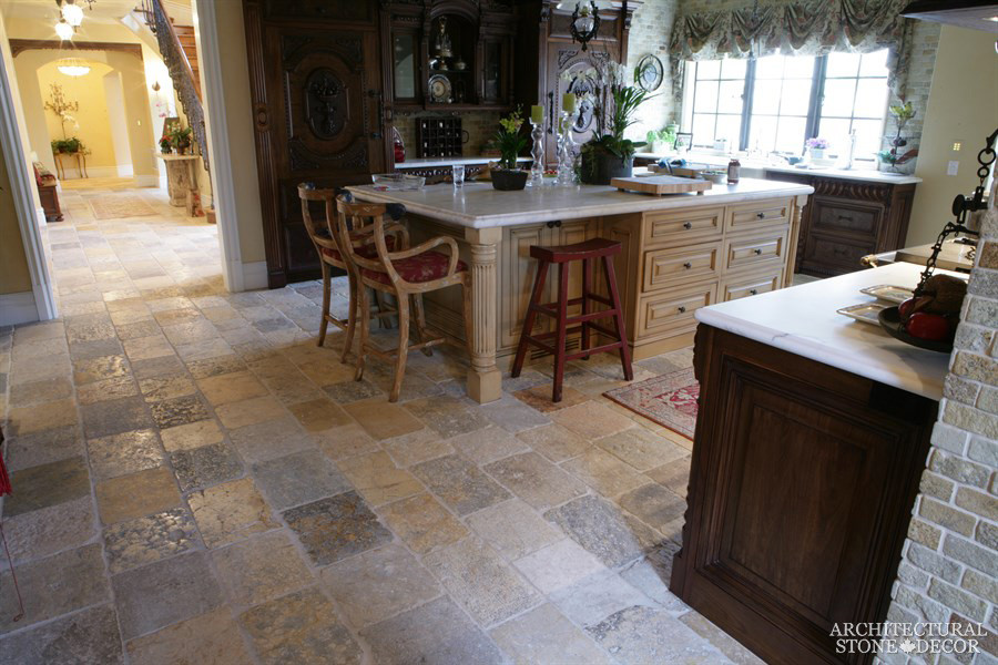 Large tuscan limestone floor eat-in kitchen photo in Toronto with limestone backsplash