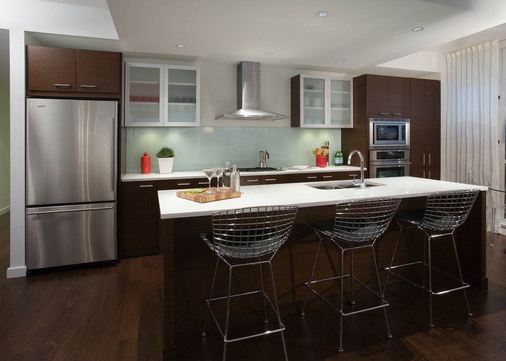 Contemporary kitchen in Vancouver with stainless steel appliances.