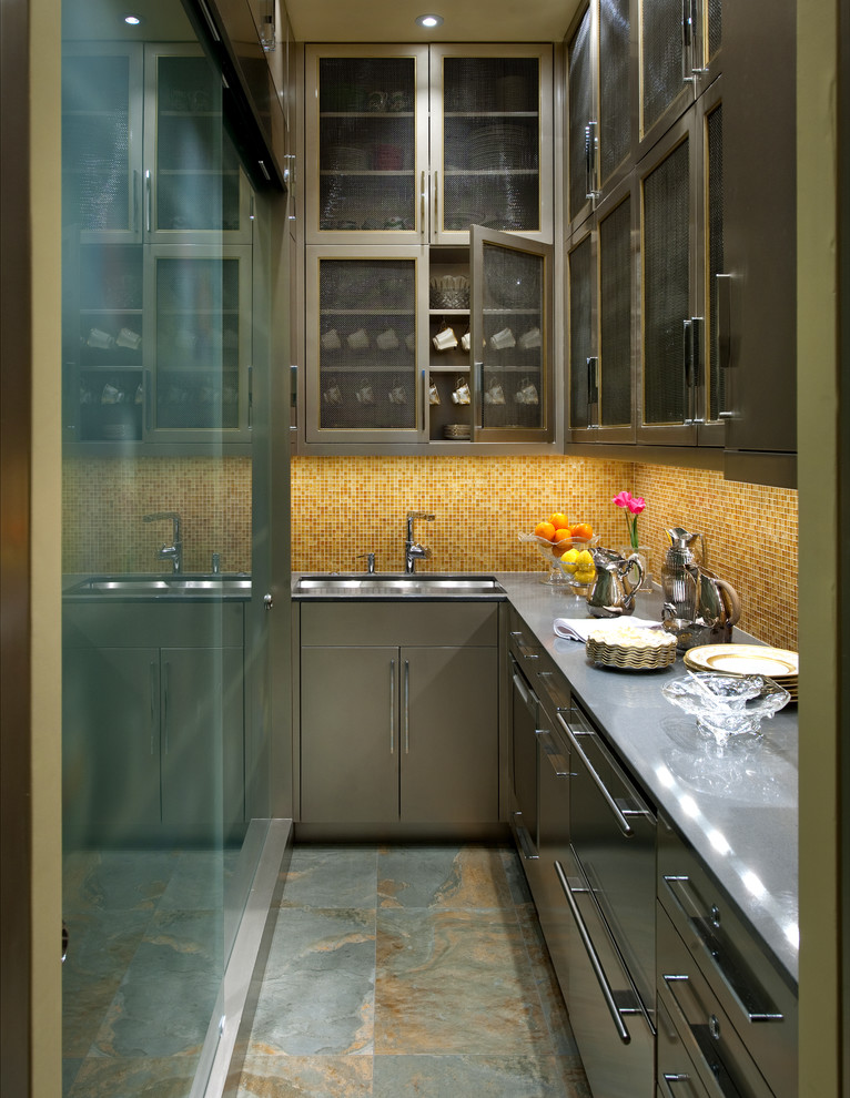 This is an example of a small contemporary l-shaped kitchen pantry in Dallas with a submerged sink, flat-panel cabinets, grey cabinets, composite countertops, yellow splashback, mosaic tiled splashback, stainless steel appliances, slate flooring and no island.