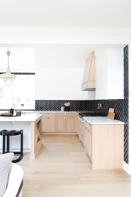 Two-Tone Delight: Modern Farmhouse Kitchen Ideas with Black Herringbone Backsplash Tiles