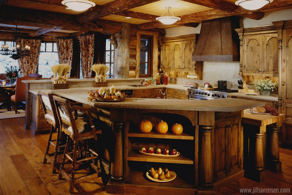 Immagine di un ampio cucina con isola centrale stile rurale