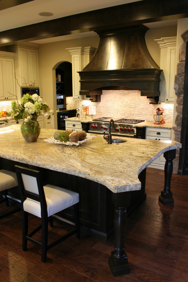 Elegant kitchen photo in Portland with granite countertops