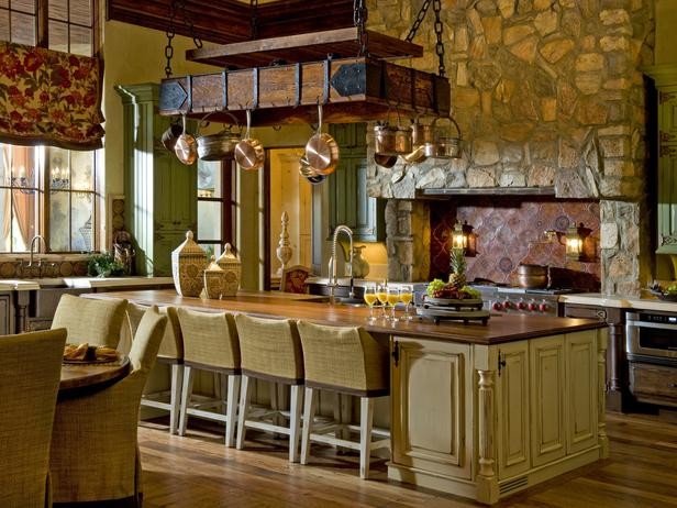 Exempel på ett lantligt kök med öppen planlösning, med en rustik diskho, skåp i slitet trä, träbänkskiva, flerfärgad stänkskydd, stänkskydd i terrakottakakel och integrerade vitvaror