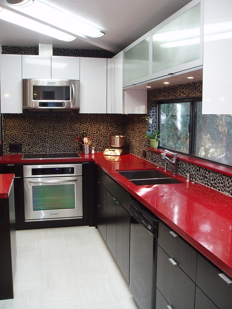 Inspiration for a modern kitchen remodel in Sacramento with red countertops