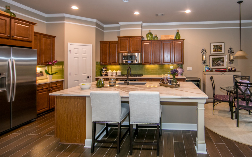 Example of a classic eat-in kitchen design in Atlanta with quartzite countertops, green backsplash, an island and white countertops