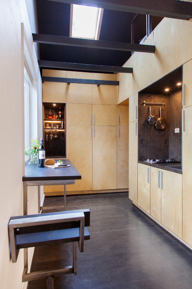 Small contemporary single-wall kitchen/diner in Portland with plywood flooring and no island.